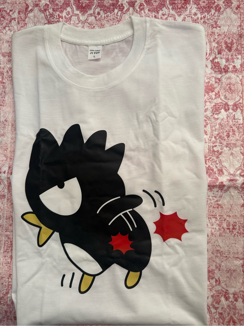 White Graphic Tee with Black Cartoon Character -